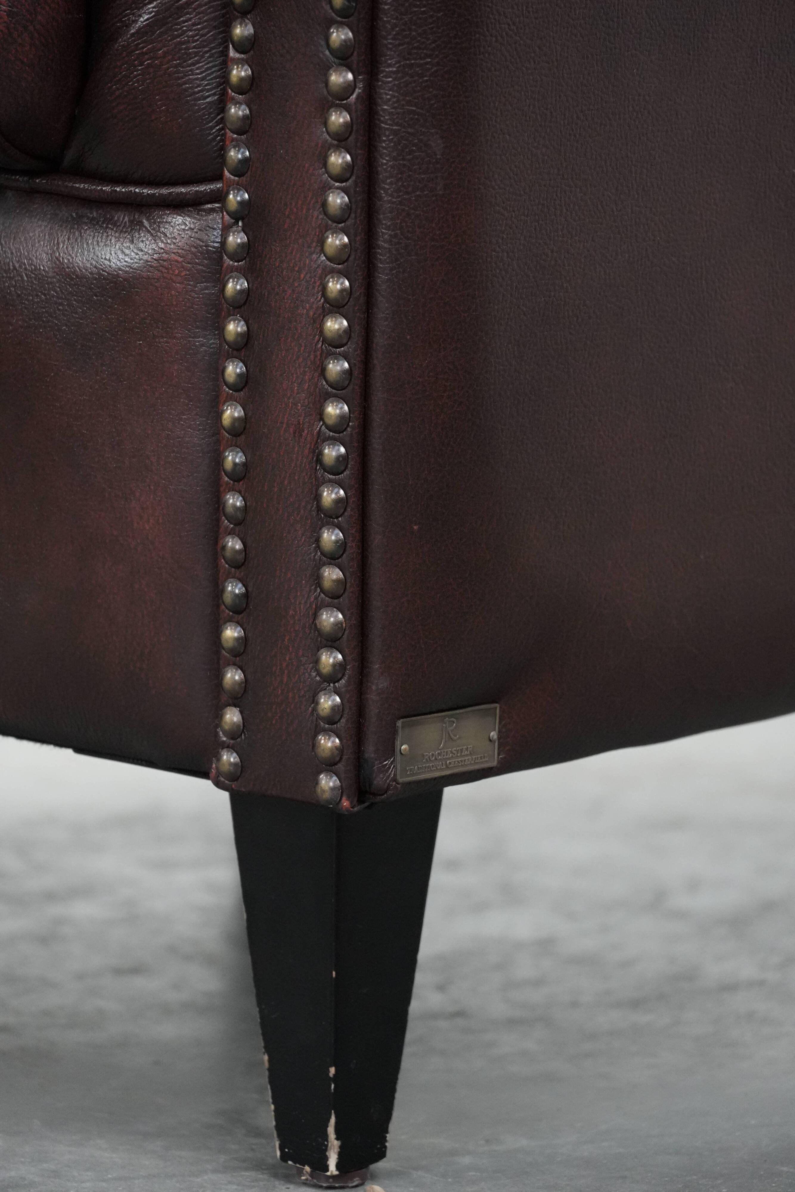 Classic English-style Chesterfield club armchair in cowhide leather