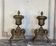 Pair of Louis XIV style andirons in bronze after a design by André-Charles Boulle.