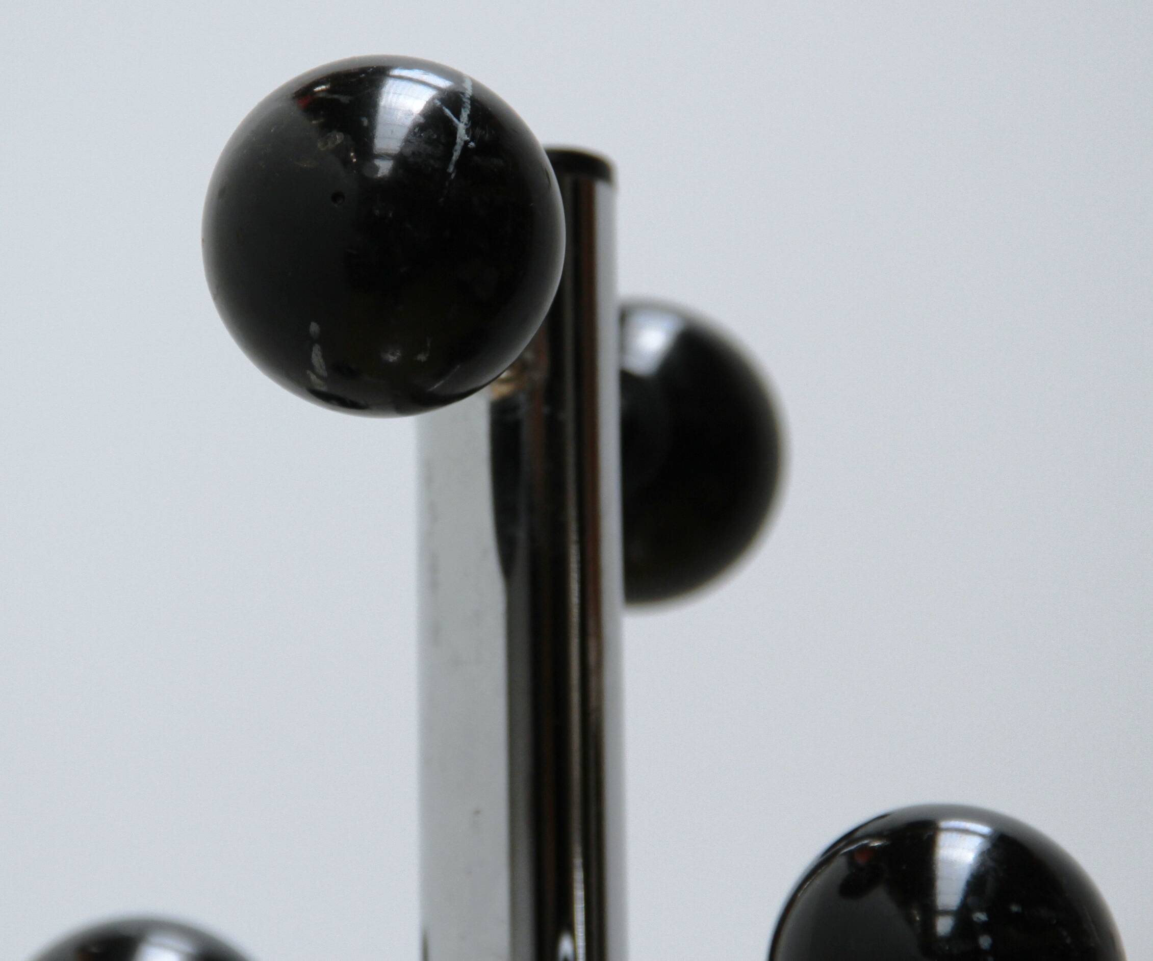 Designer stainless steel coat rack