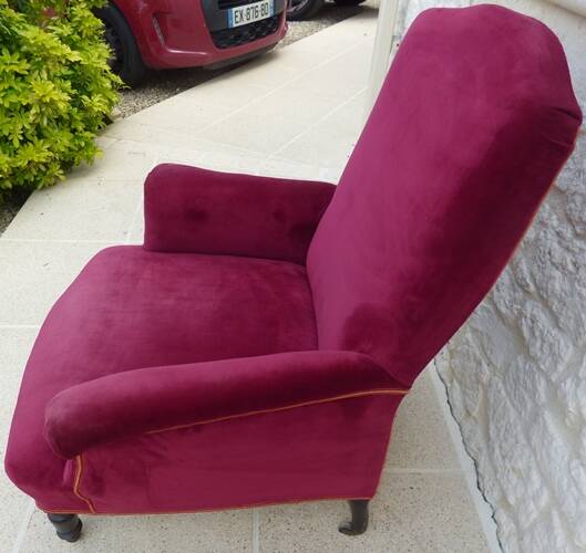 Bergère with blackened wooden legs on casters, Napoleon III period, velvet upholstery