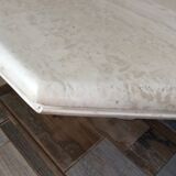 Octagonal coffee table in travertine