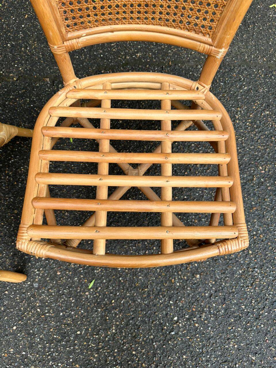 2 rattan and caned chairs in colonial bistro style from the 1990s.