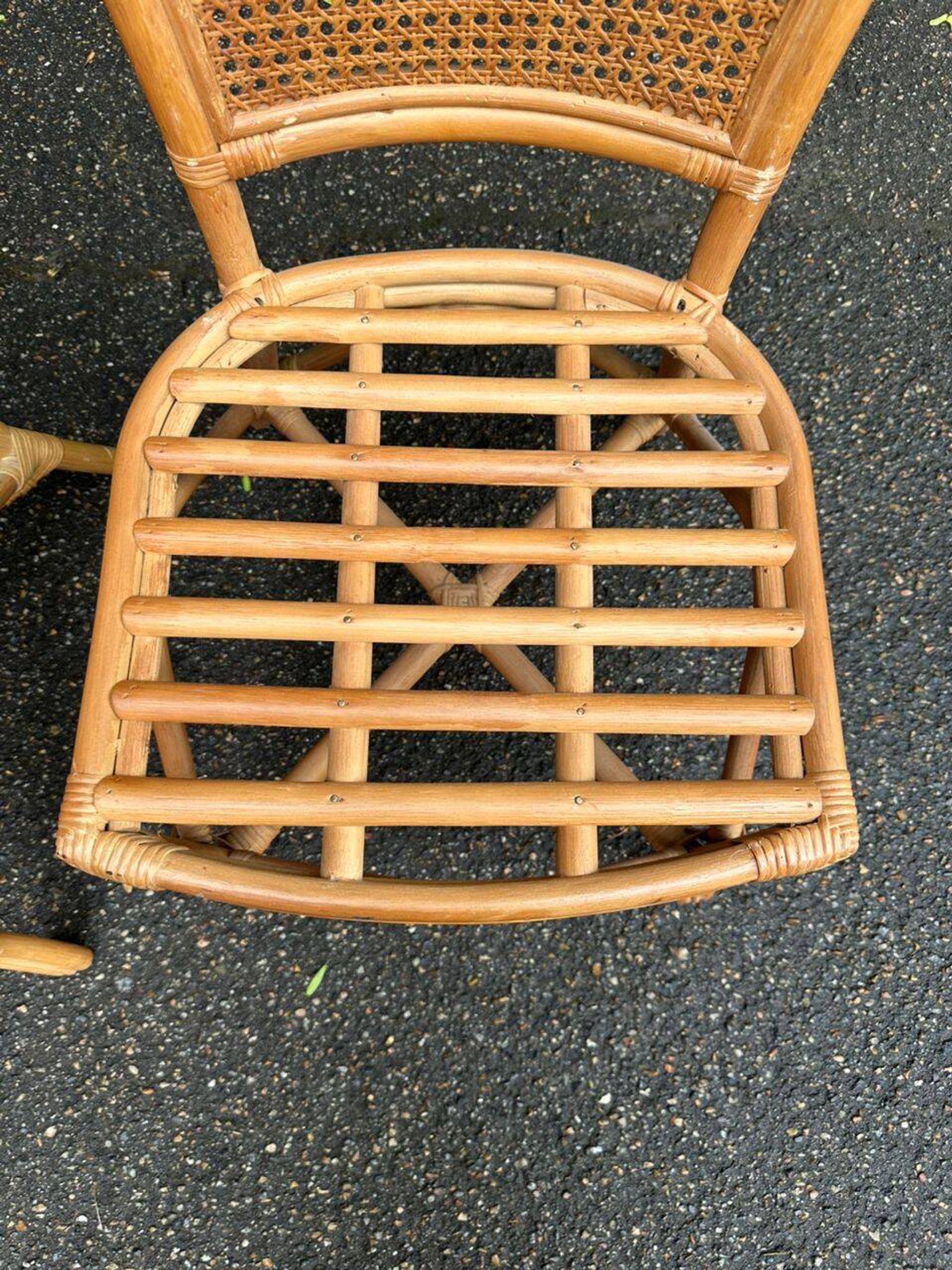 2 rattan and caned chairs in colonial bistro style from the 1990s.