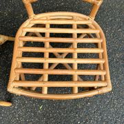 2 rattan and caned chairs in colonial bistro style from the 1990s.