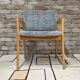 Vintage armchair from the 60s/70s in wood and grey fabric – with armrests.