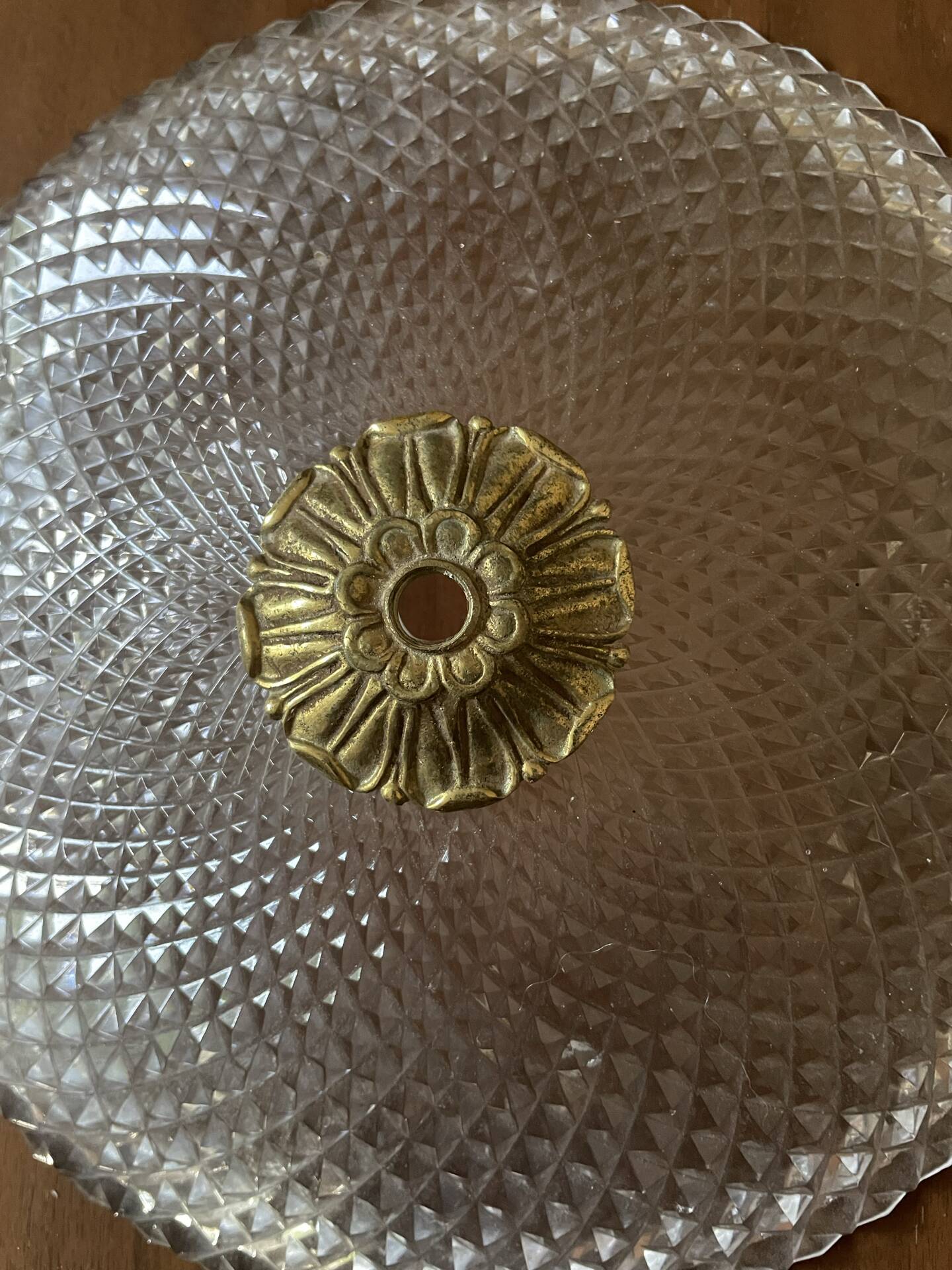 Antique ceiling light in bronze and cut crystal with diamond points.