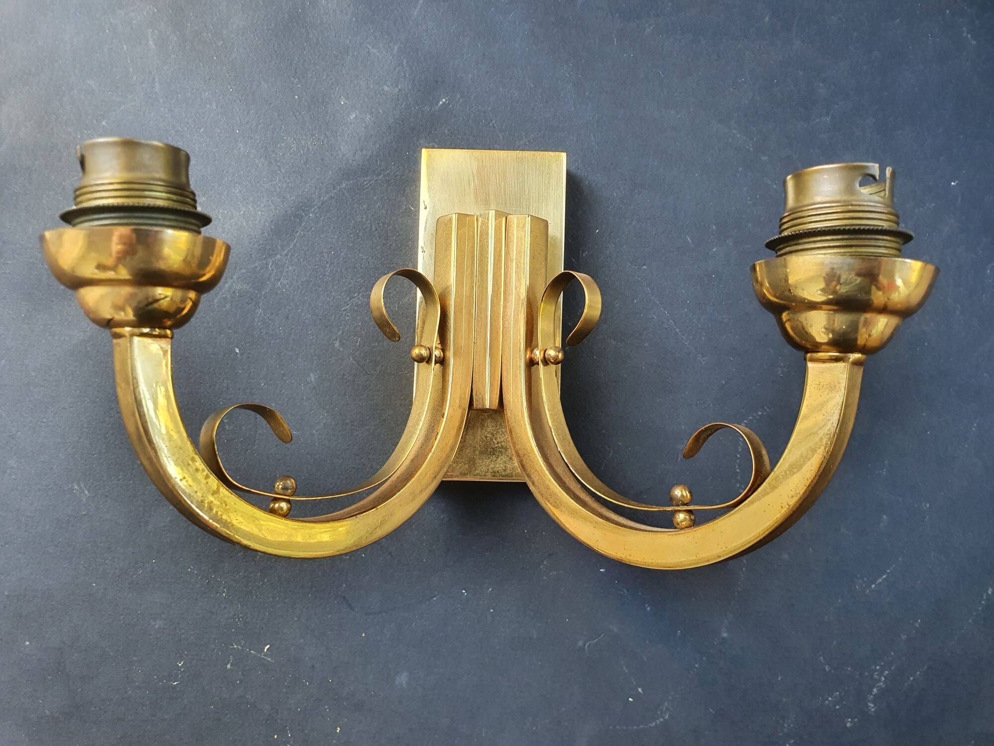 Pair of bronze wall sconces with 1940s Art Deco lampshades.