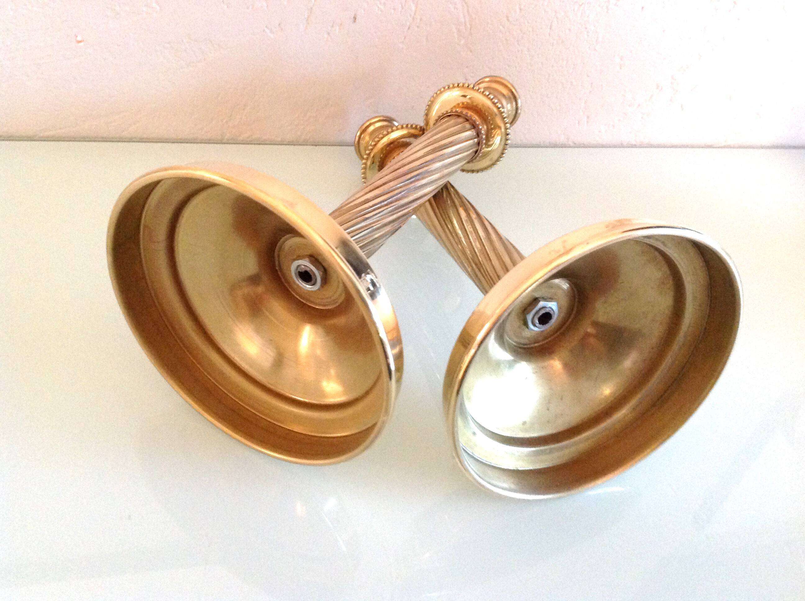 Pair of empire style brass candlesticks