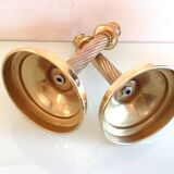 Pair of empire style brass candlesticks