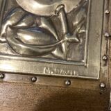 Pair of Art Deco wood and embossed metal landscape frames