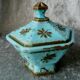 Sucrier en oplaine de foire turquoise signe vallerysthal decor de papillons