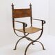 Fauteuil curule en fer forgé et cuir