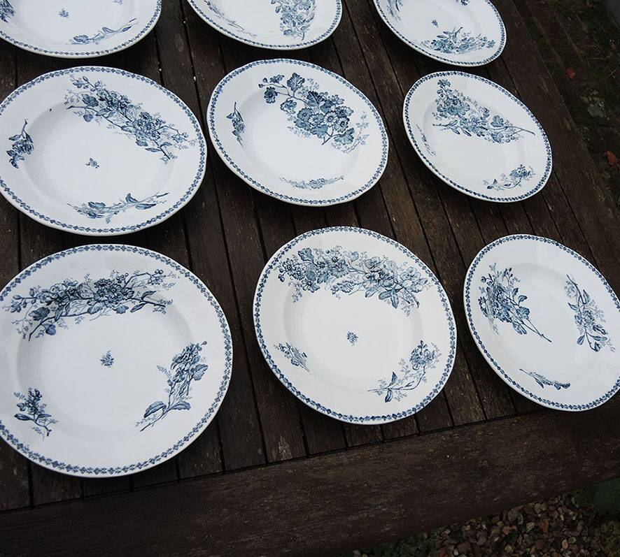 10 old deep plates made of ironstone with floral decoration