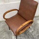 Mid-Century Scandinavian vintage retro armchair with oval armrests.