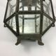 Metal and brass wall light with mirror background 1900