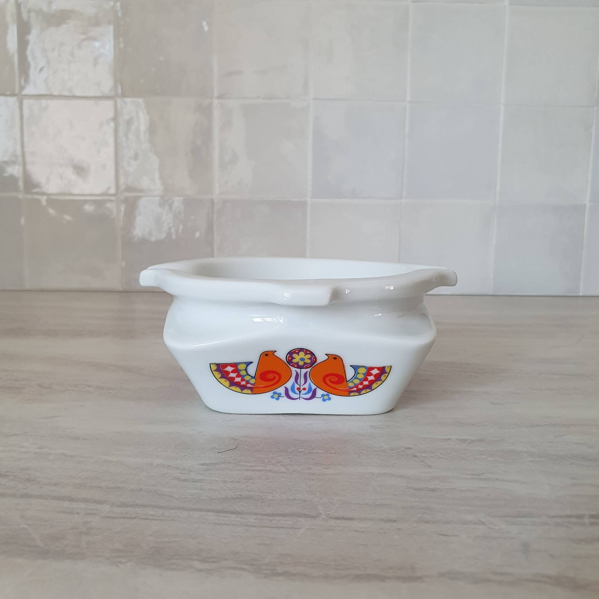 Ceramic ashtray with bird design