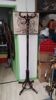 Wooden parrot coat rack with painted floral decoration.