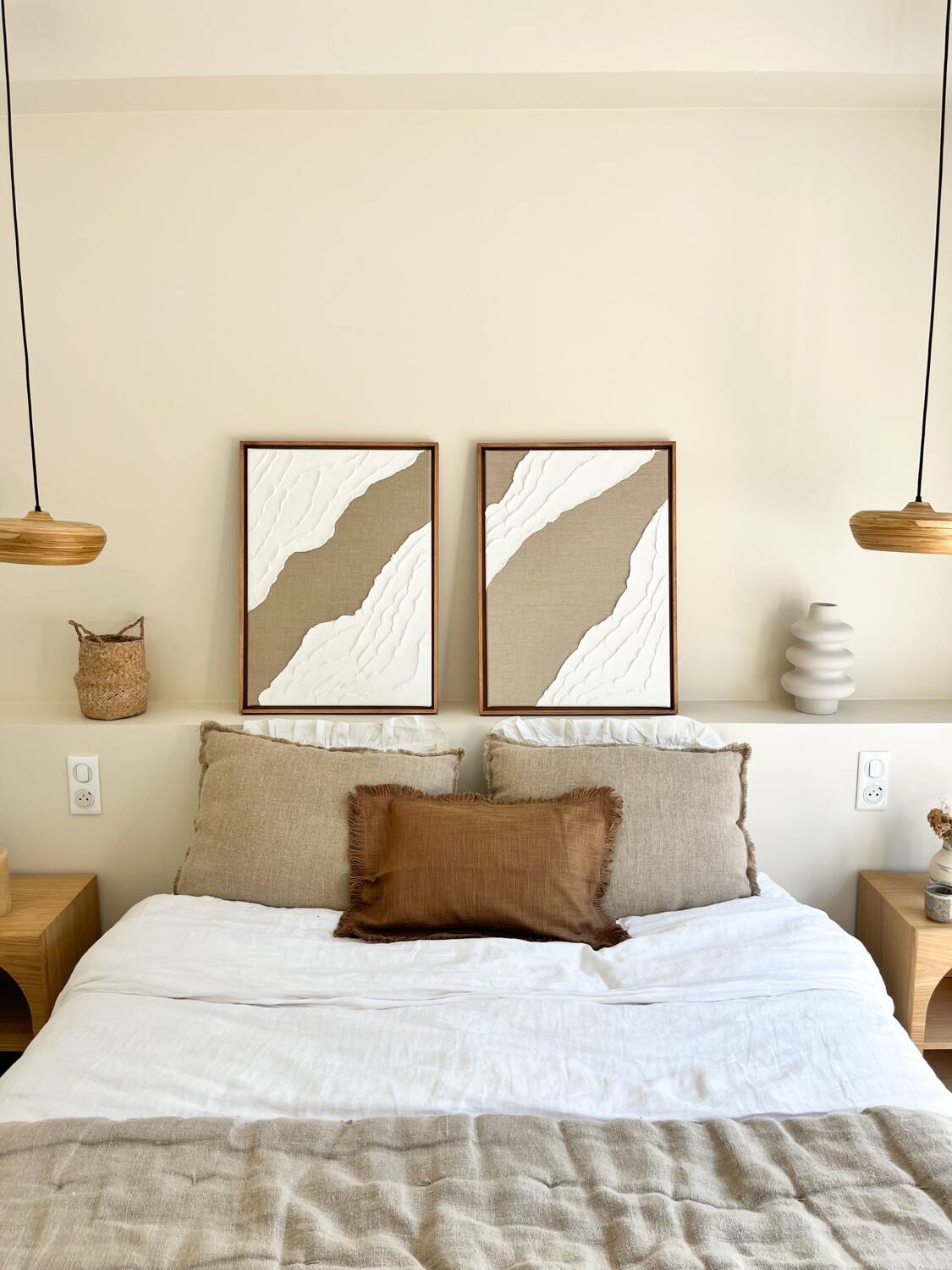 Diptych relief panels in linen and white.