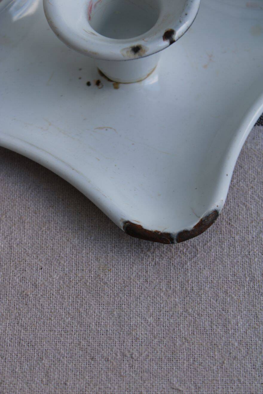 Antique enamel candle holder