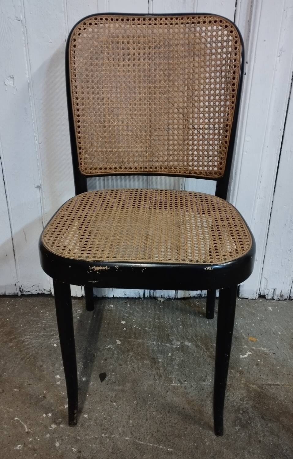 Wooden and cane chair