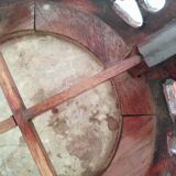 Carved wooden side table, red marble top embedded