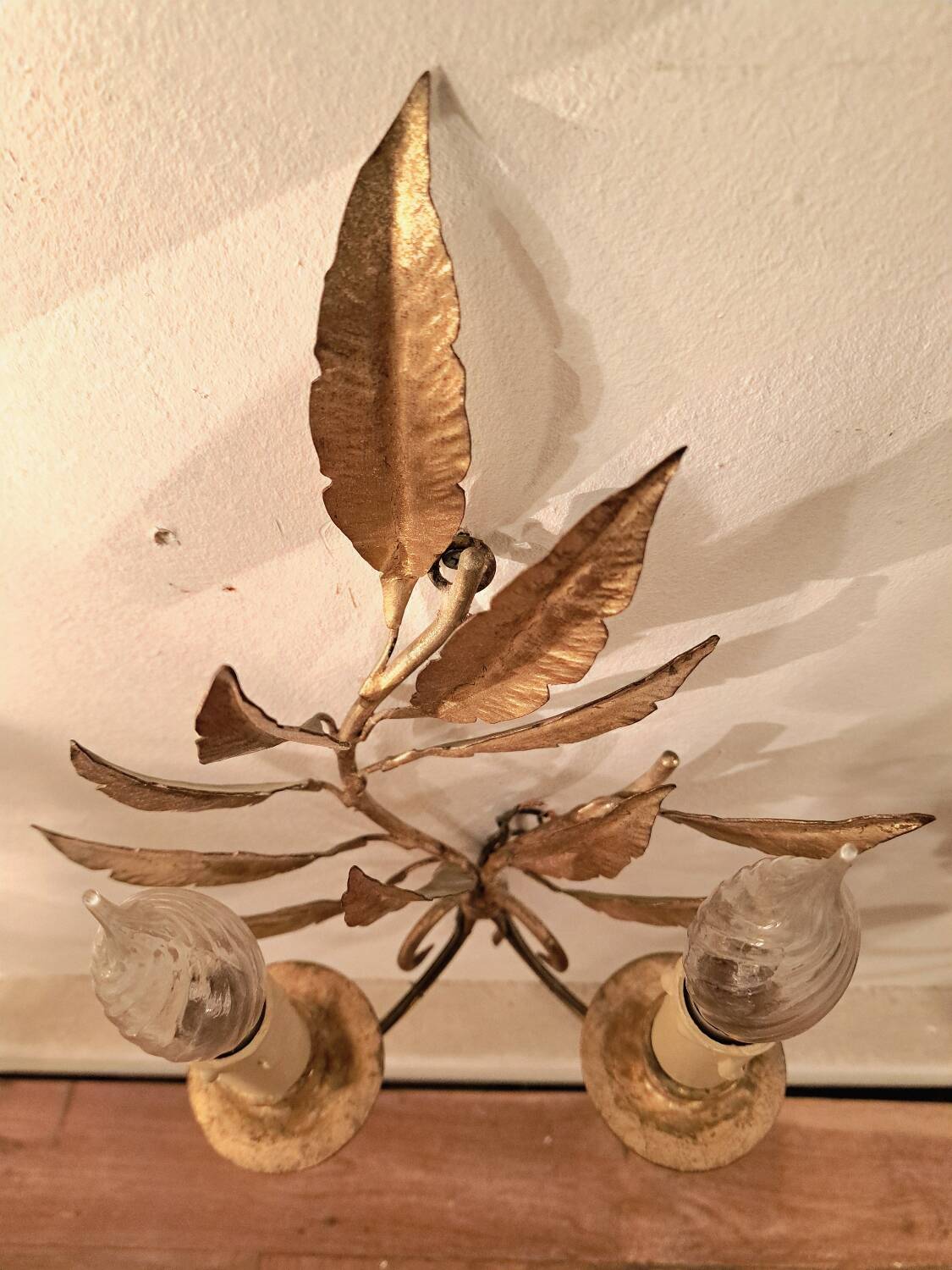 Pair of gold-tone metal leaf wall sconces