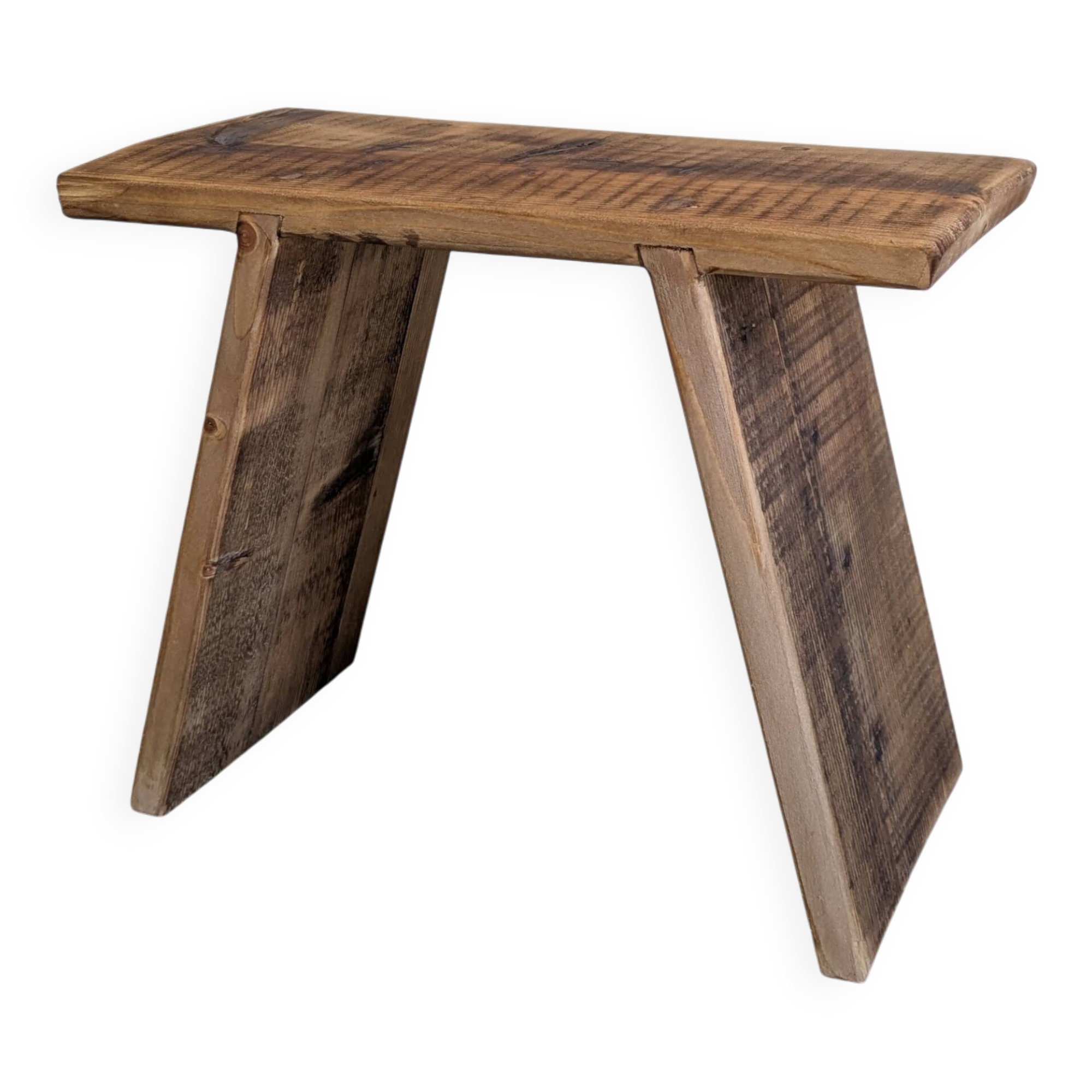 Antique wooden stool with patina from a flea market.