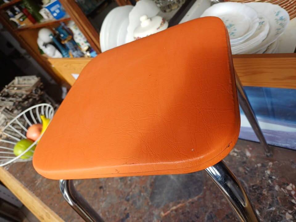 Orange leatherette stool from the 60s/70s