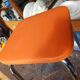 Orange leatherette stool from the 60s/70s