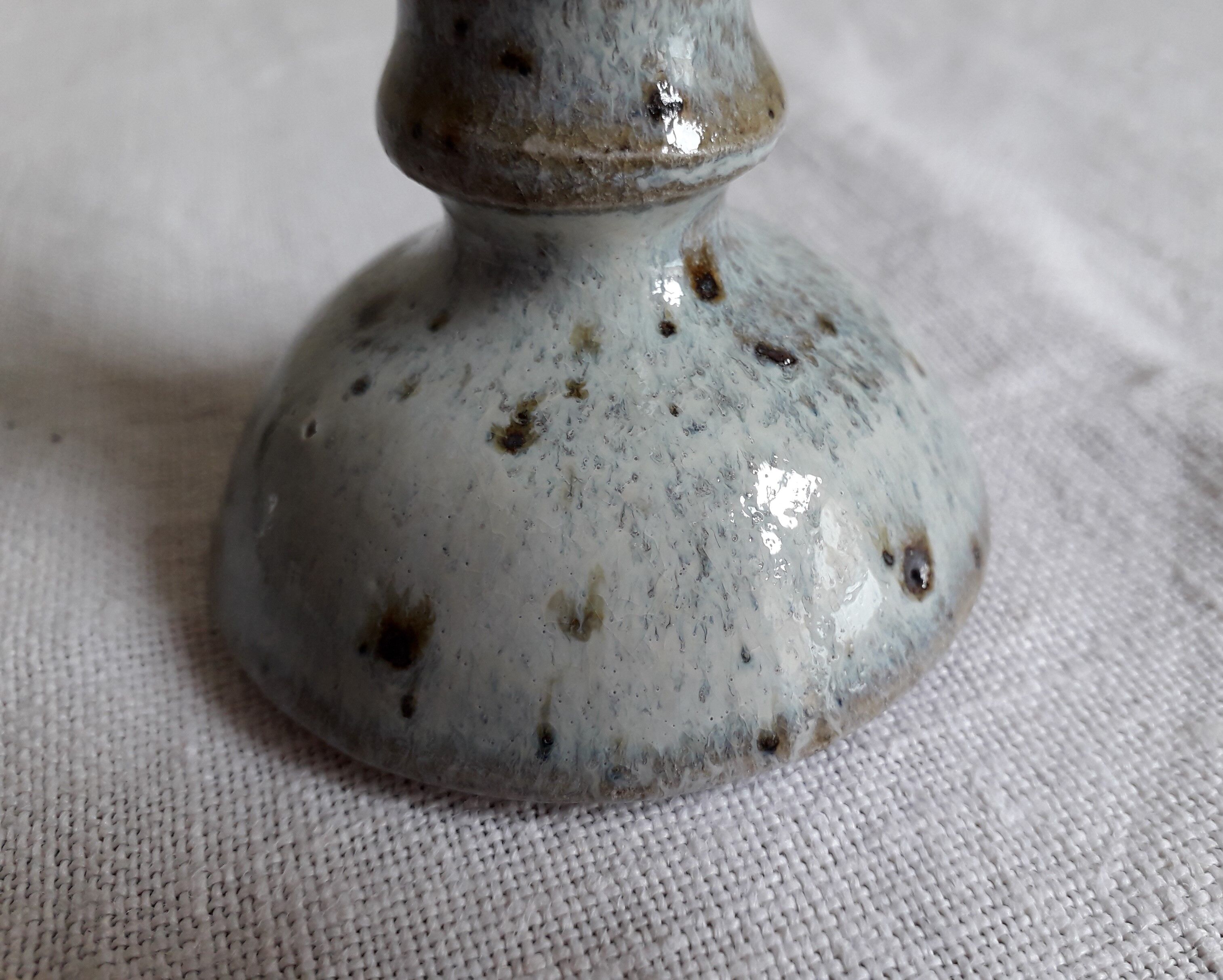 Pair of sandstone candlesticks