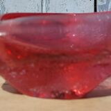 Empty pink blown glass pocket