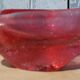 Empty pink blown glass pocket