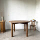 Brutalist round table in solid oak, 1950s.