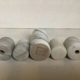 Five marble candlesticks