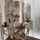 Candle holder or candelabrum with four arms of light.