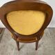 Paire de fauteuils médaillon en bois et velours