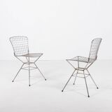 Pair of vintage Italian architectural design steel wire chairs from the 1970s