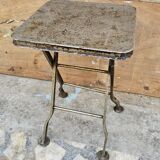 Old industrial folding steel stool