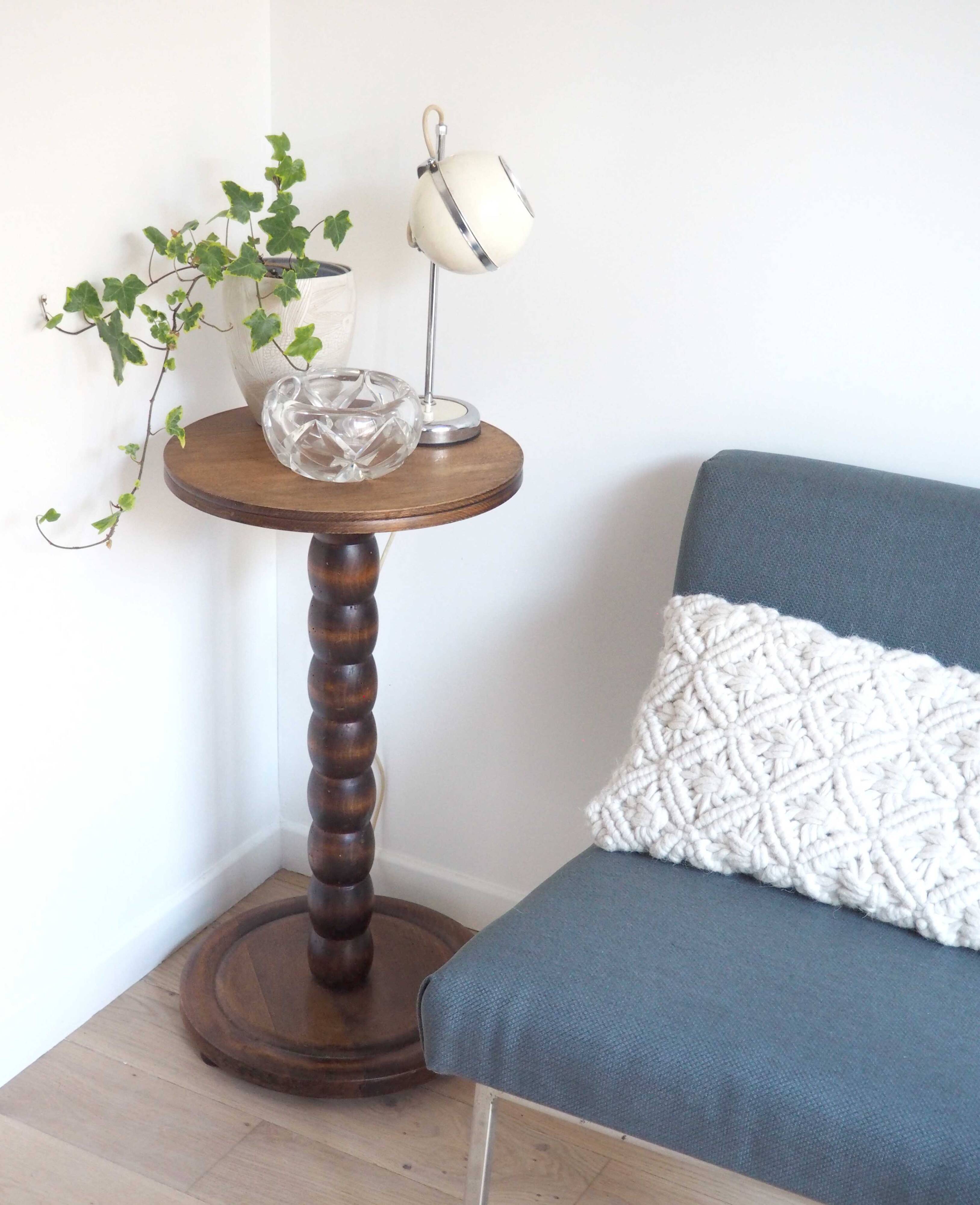 Stele, wooden beaded pedestal table