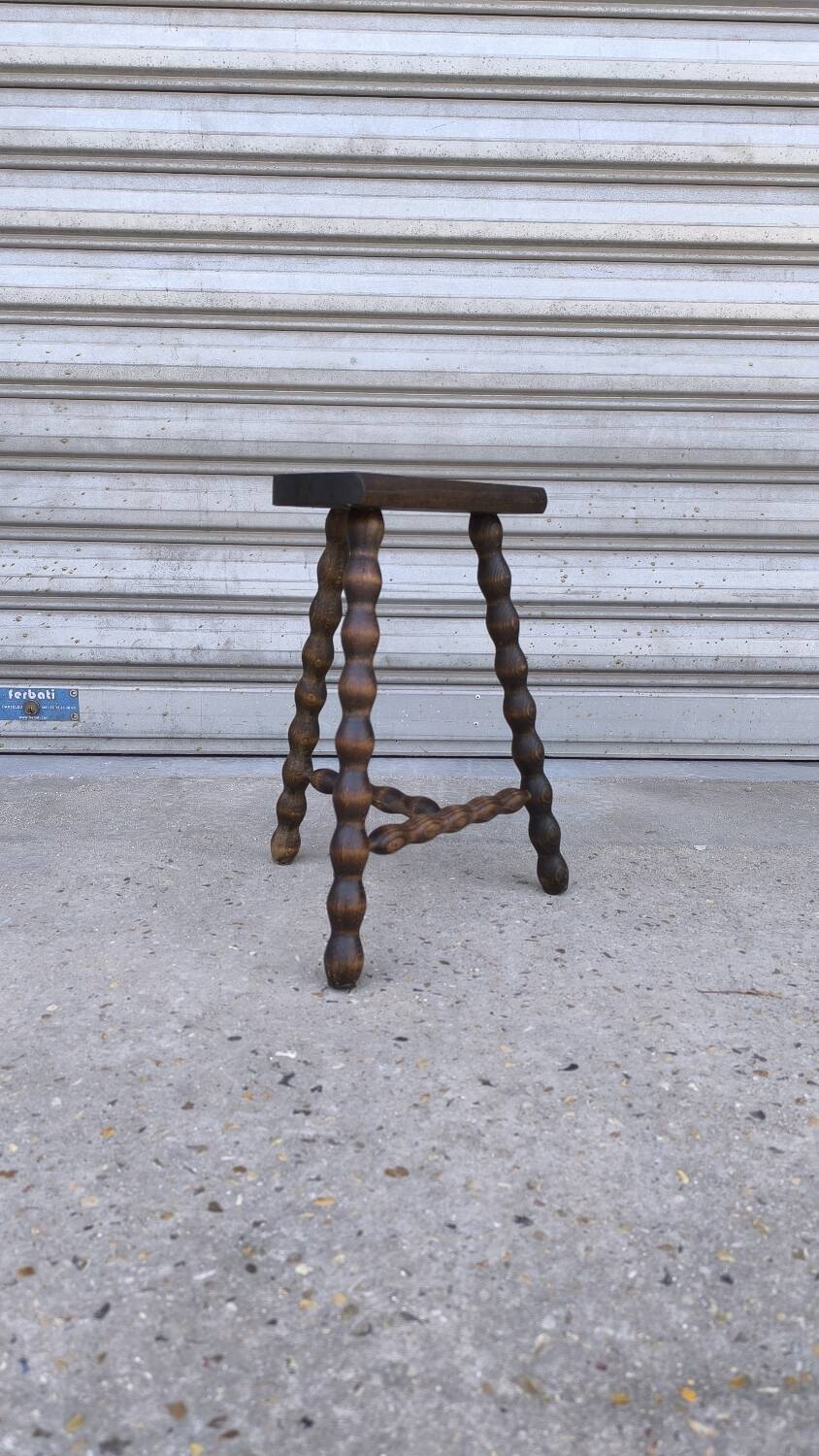 Turned wooden tripod stool