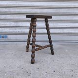 Turned wooden tripod stool