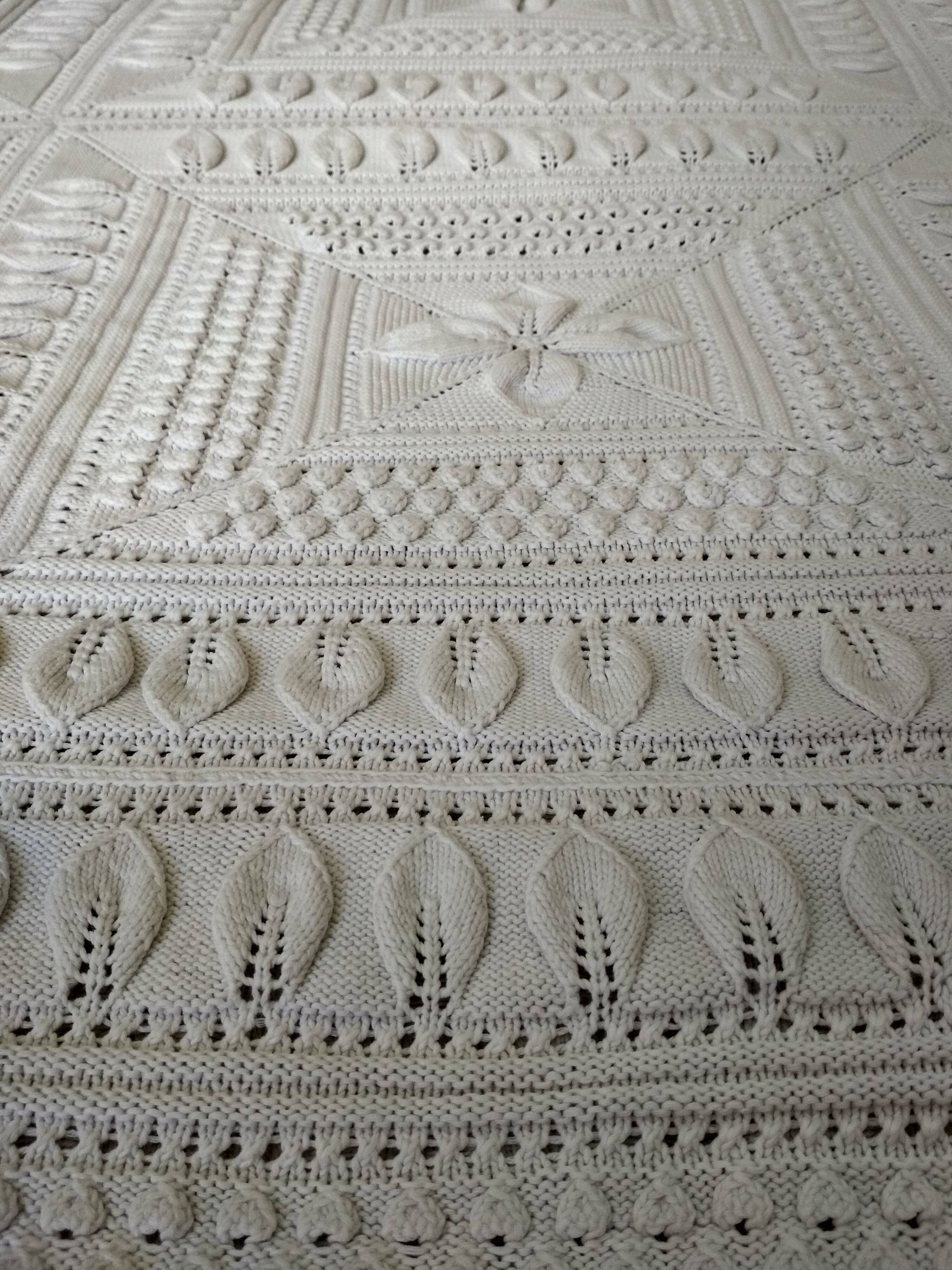 Knitted white cotton bedspread