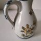 Small Malicorne pitcher with hand-painted floral decoration