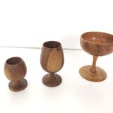 Trio of egg cup glasses and Scandinavian wooden cup