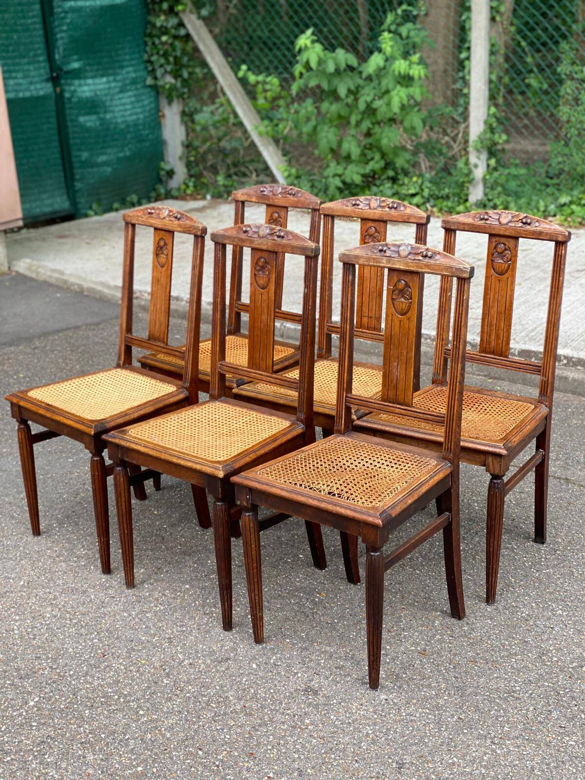 6 Art Deco dining chairs made of solid oak with caning from the 1950s.