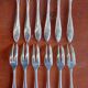 12 silver-plated metal condiment forks for shellfish by Christofle, Albi model.