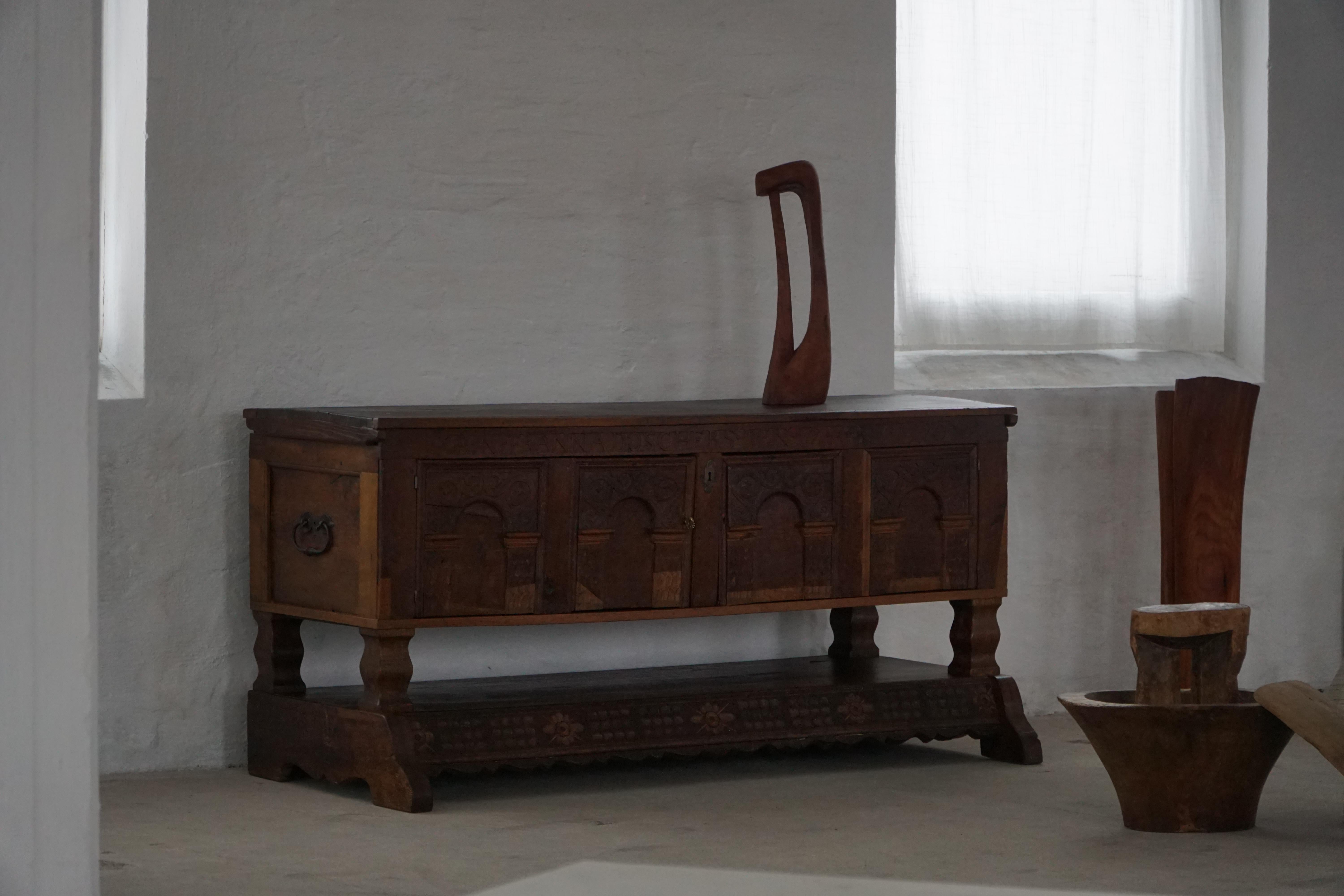 Danish baroque oak buffet from the early 18th century, carved details, 1700-1750.