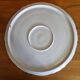 Antique pie dish in St Clément faience with a basket hen motif.