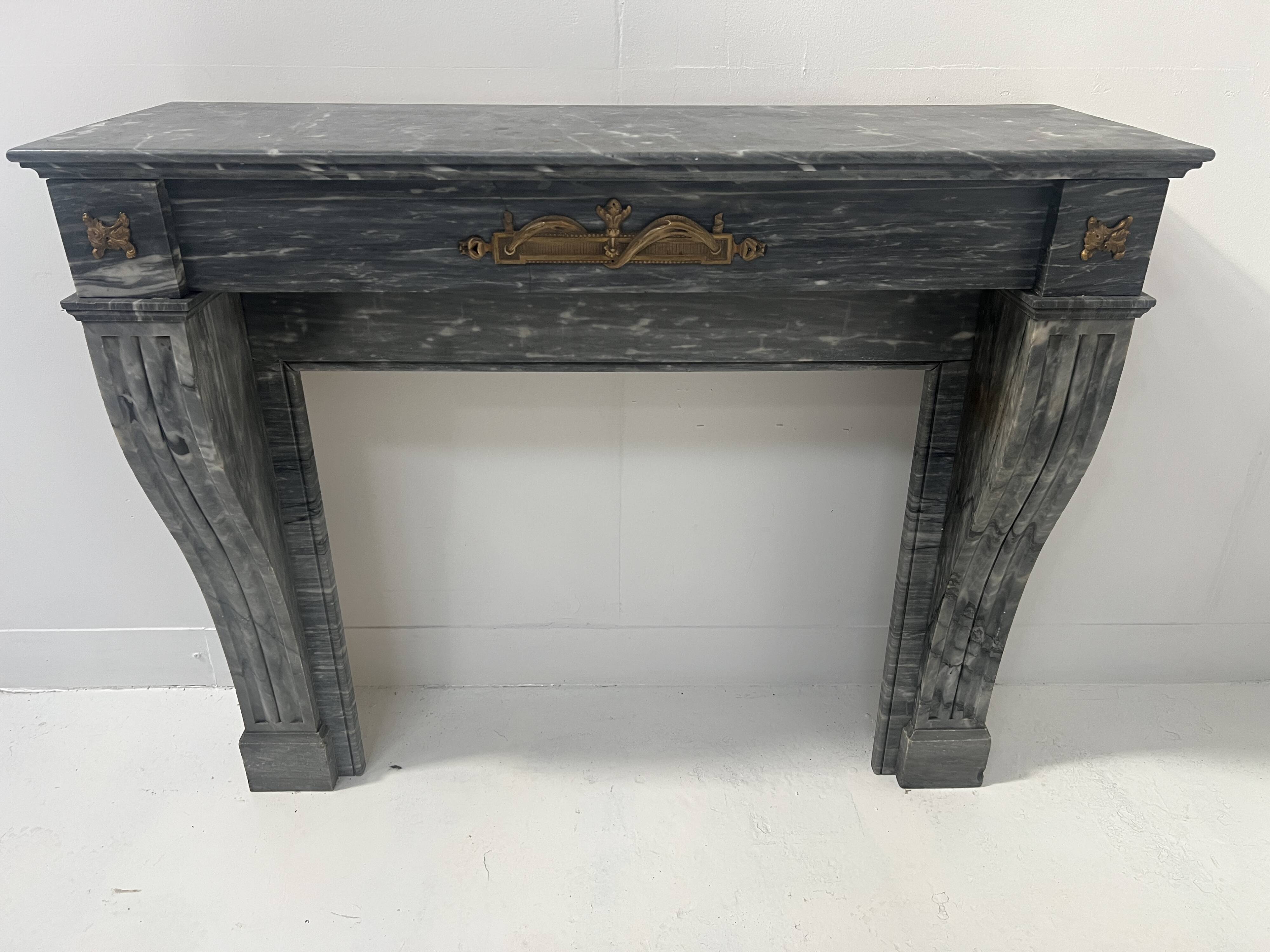 Napoleon III fireplace in blue Turquin marble from the 19th century.
