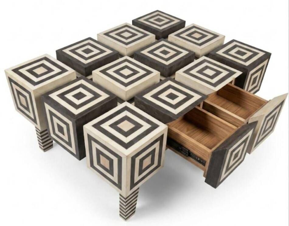 An Art Deco Op Art coffee table made of beech wood with drawers.